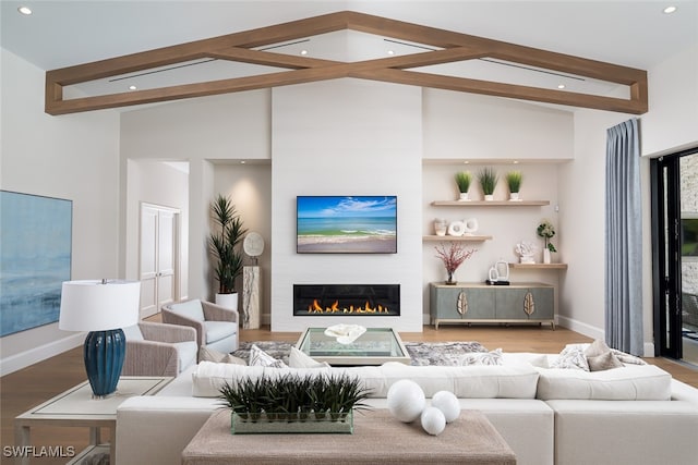 living room with hardwood / wood-style floors, high vaulted ceiling, and beamed ceiling