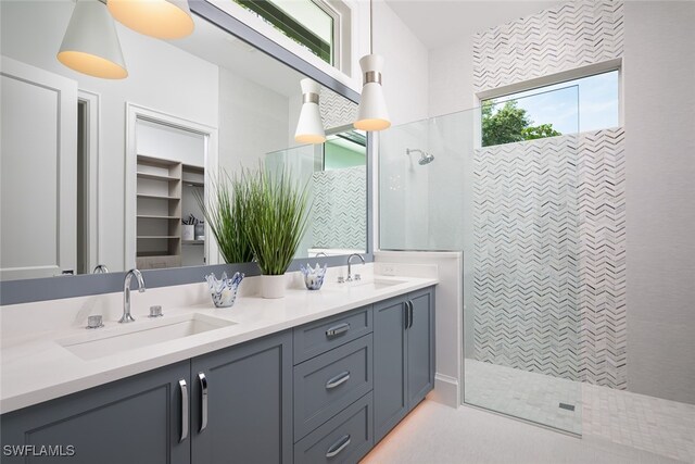 bathroom featuring vanity and walk in shower