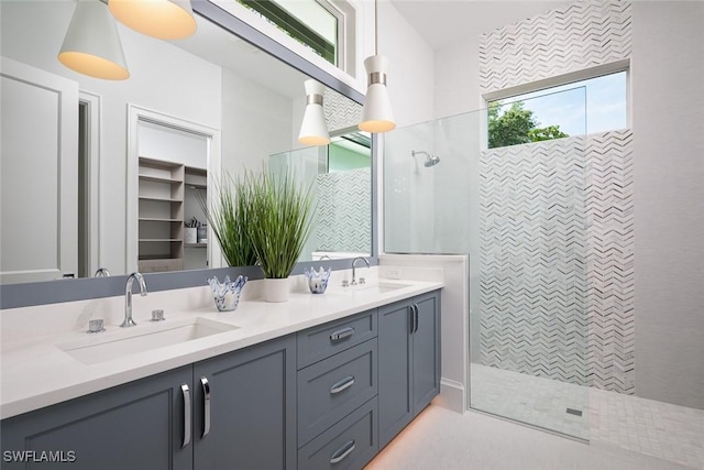 137 Tupelo Rd, Naples, FL 34108 - full bathroom featuring double vanity and a walk in shower