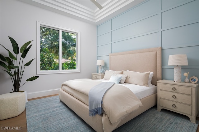 bedroom featuring dark hardwood / wood-style flooring