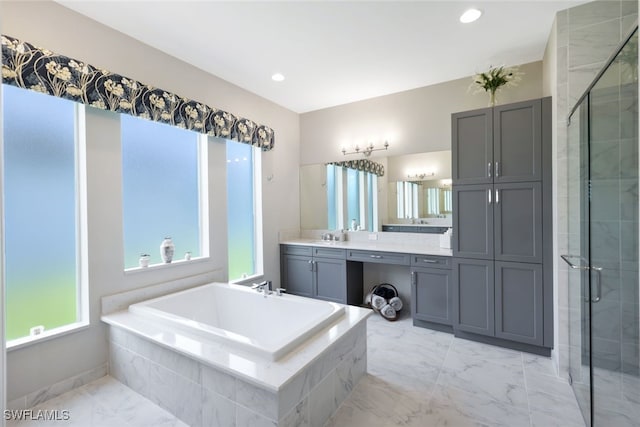 bathroom featuring vanity and plus walk in shower