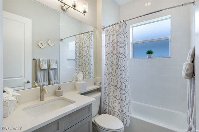 full bathroom with toilet, vanity, and shower / bath combination with curtain