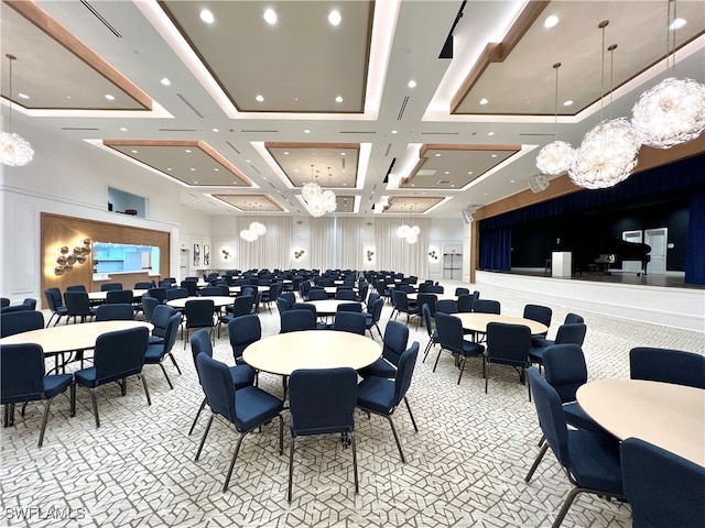 dining area with beamed ceiling and coffered ceiling