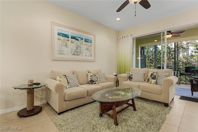 tiled living room featuring ceiling fan