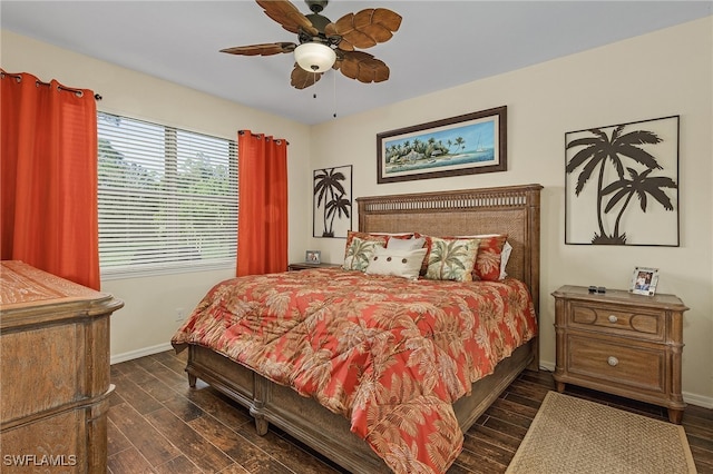 bedroom featuring ceiling fan and dark hardwood / wood-style flooring