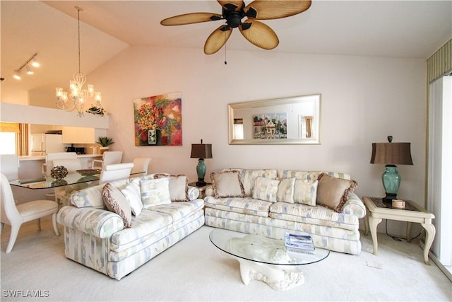 living room featuring carpet flooring, ceiling fan with notable chandelier, and lofted ceiling