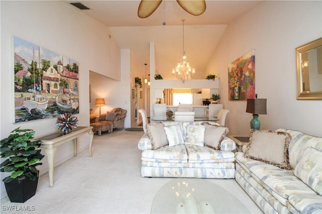 living room featuring carpet flooring, ceiling fan with notable chandelier, and lofted ceiling