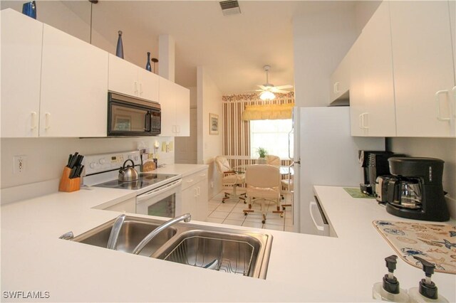 kitchen featuring ceiling fan, sink, electric range, dishwasher, and white cabinets