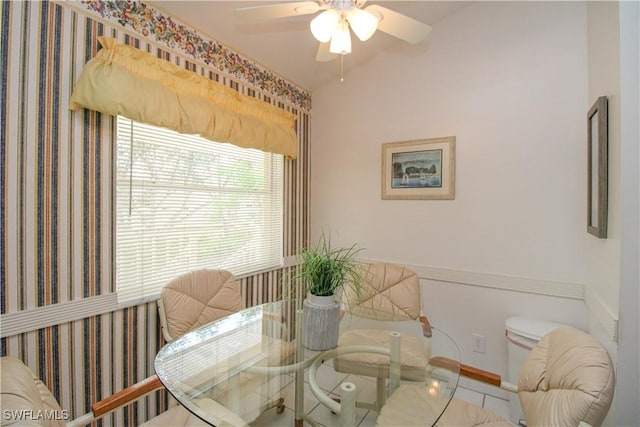 dining room with tile patterned flooring and ceiling fan