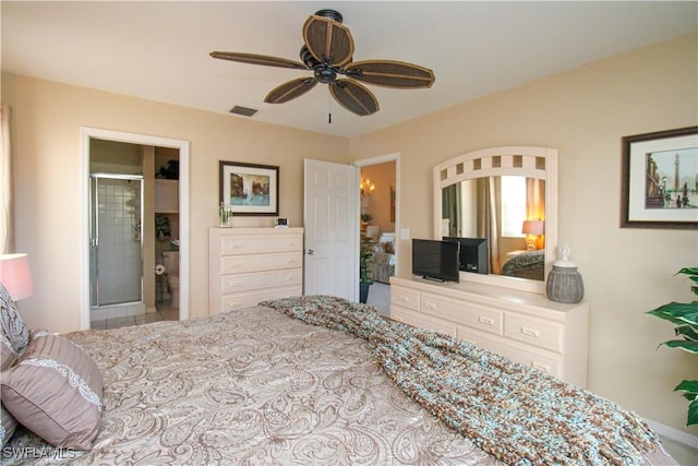 bedroom featuring ensuite bath and ceiling fan