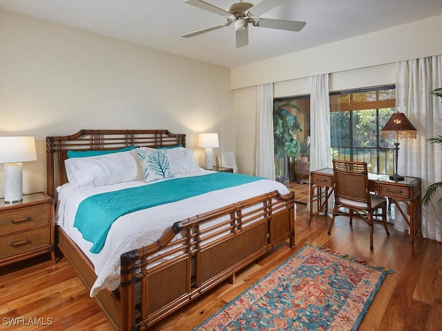 bedroom featuring wood-type flooring and ceiling fan