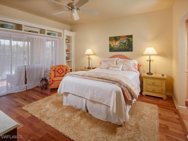 bedroom featuring ceiling fan and wood-type flooring