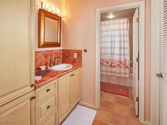 4021 Whiskey Pointe Ln Unit 202, Bonita Springs, FL 34134 - full bath featuring vanity, decorative backsplash, and shower / bath combo