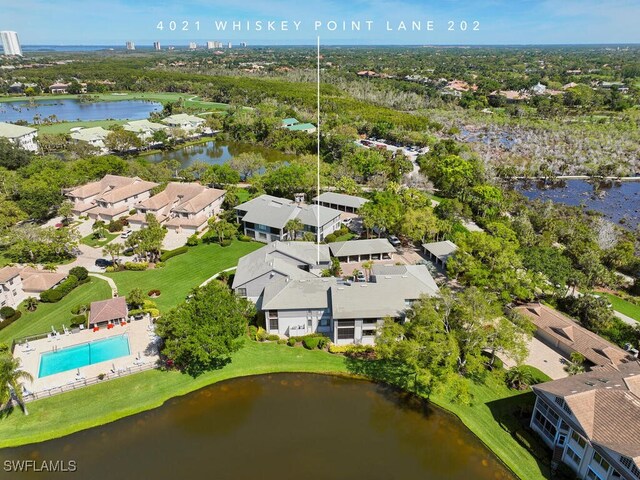 bird's eye view with a water view