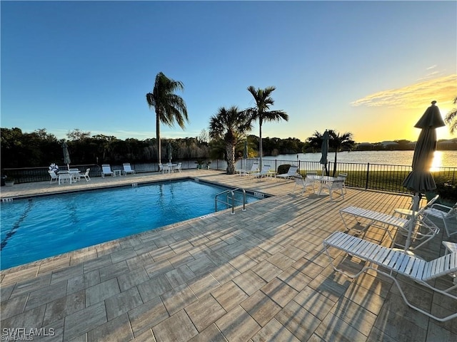 4021 Whiskey Pointe Ln Unit 202, Bonita Springs, FL 34134 - community pool featuring a patio