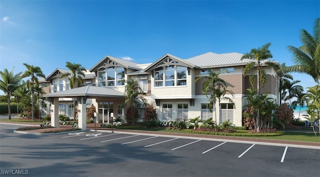 4021 Whiskey Pointe Ln Unit 202, Bonita Springs, FL 34134 - view of building exterior with uncovered parking
