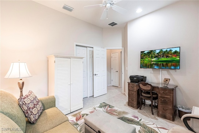 living room with ceiling fan