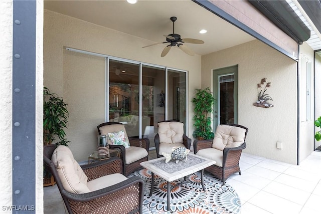 view of patio / terrace featuring ceiling fan