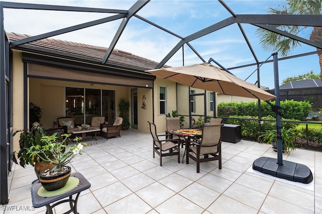 view of patio with a lanai