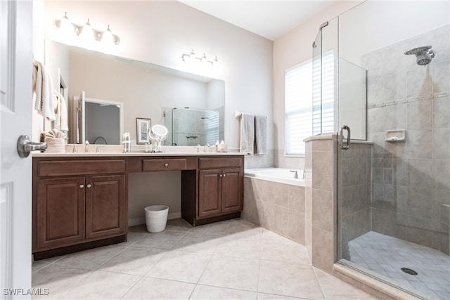 bathroom featuring vanity, plus walk in shower, and tile patterned flooring