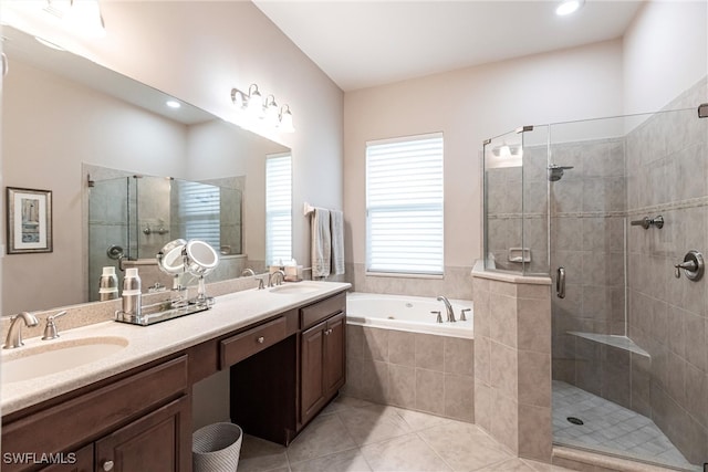 bathroom with vanity, independent shower and bath, and tile patterned flooring