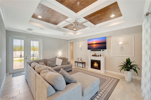 living room with french doors, coffered ceiling, beamed ceiling, ornamental molding, and light tile patterned floors