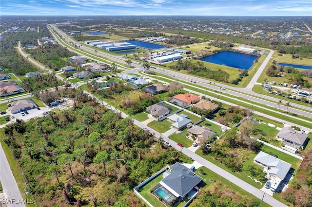 drone / aerial view featuring a water view