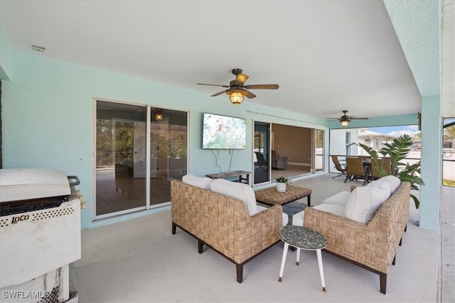 living room featuring light colored carpet and ceiling fan