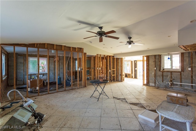 miscellaneous room with vaulted ceiling and ceiling fan