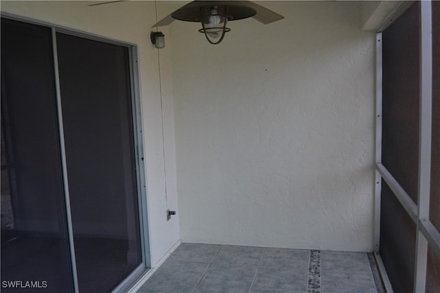 balcony featuring ceiling fan