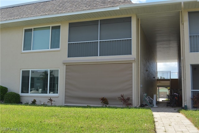 view of home's exterior featuring a yard