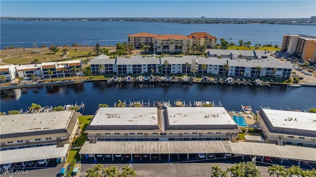 birds eye view of property featuring a water view