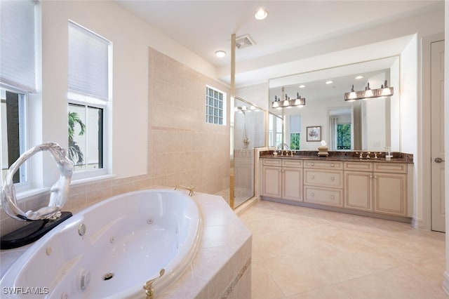 bathroom with vanity, separate shower and tub, and tile patterned floors