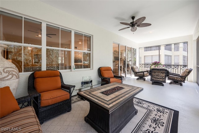 sunroom / solarium with ceiling fan