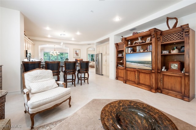 living room with a notable chandelier