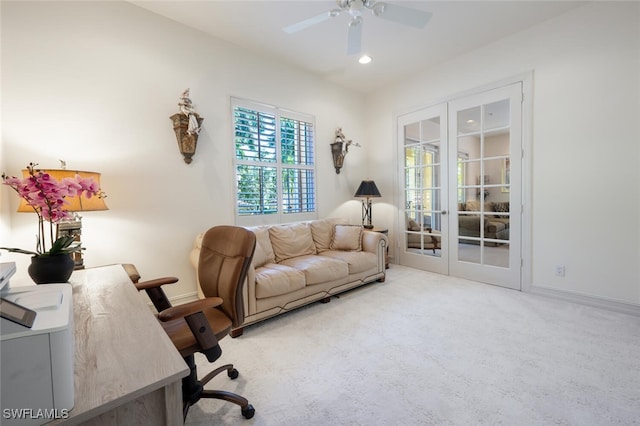 office space featuring french doors, carpet flooring, and ceiling fan