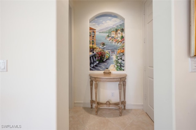 hallway featuring light tile patterned floors