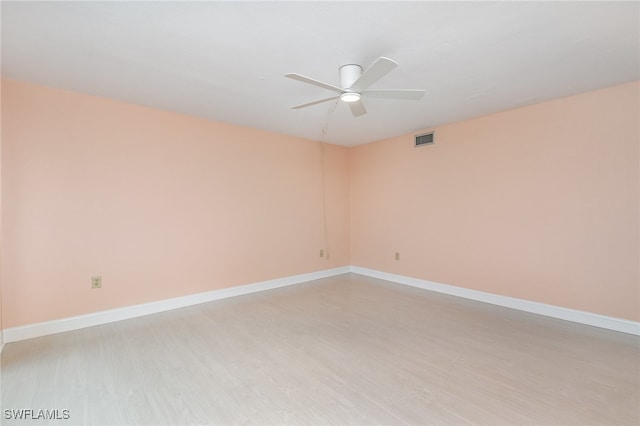 unfurnished room with light hardwood / wood-style floors and ceiling fan