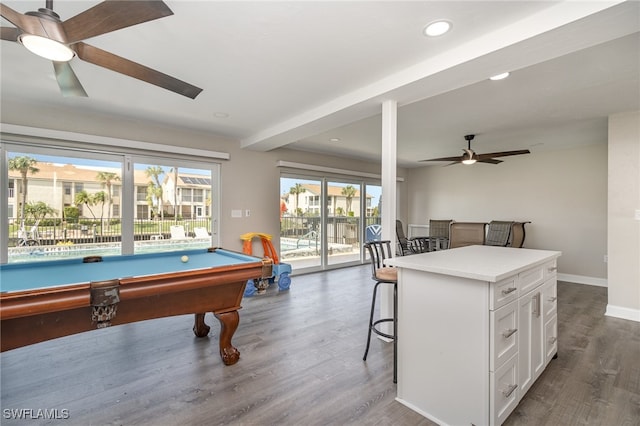 recreation room featuring dark hardwood / wood-style flooring, a healthy amount of sunlight, and billiards