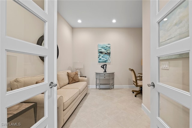 office area with french doors and light tile patterned flooring