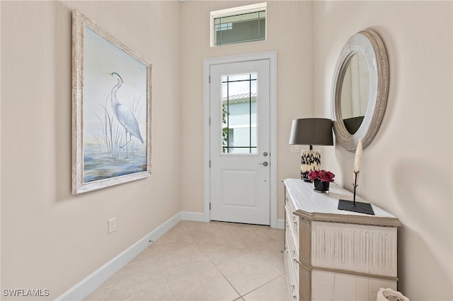 doorway featuring light tile patterned floors