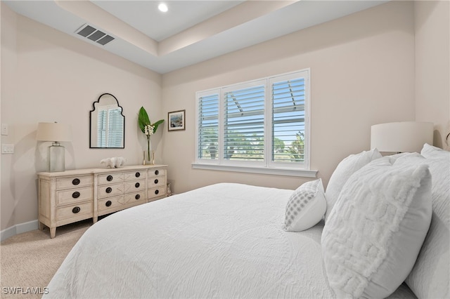 bedroom with light carpet