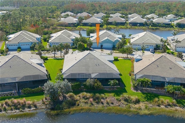 drone / aerial view with a water view