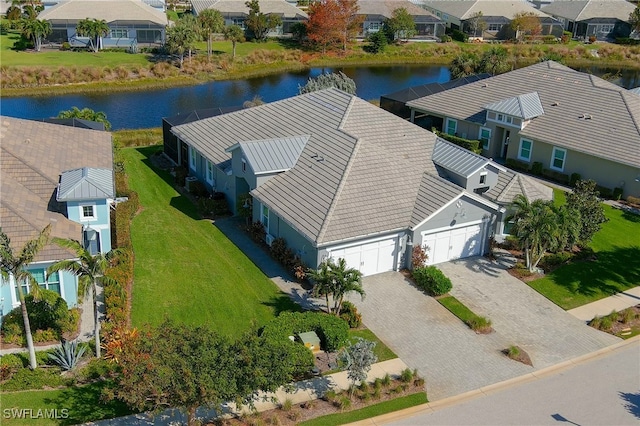 drone / aerial view featuring a water view