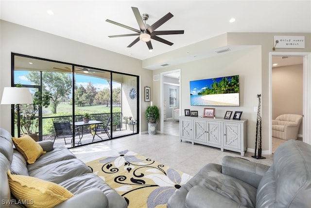 living room with ceiling fan and light tile patterned floors