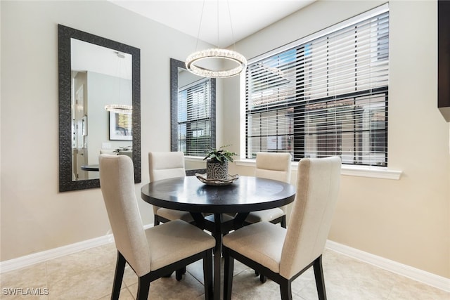 dining room featuring light tile patterned flooring