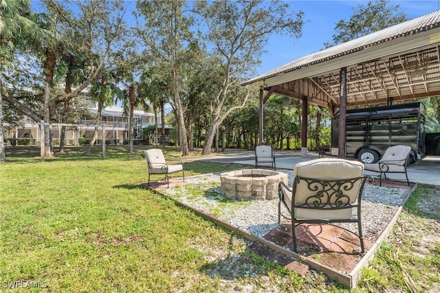 view of yard with a patio, a fire pit, and a gazebo