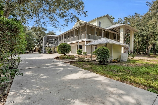 view of side of home with a porch