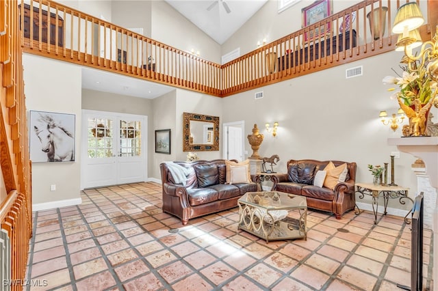 living room featuring high vaulted ceiling and ceiling fan