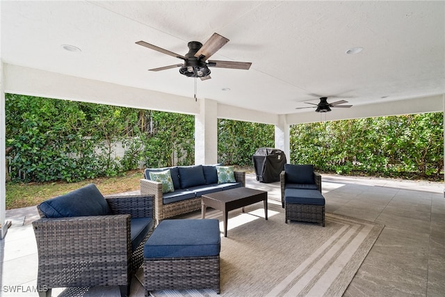 view of patio featuring ceiling fan and outdoor lounge area